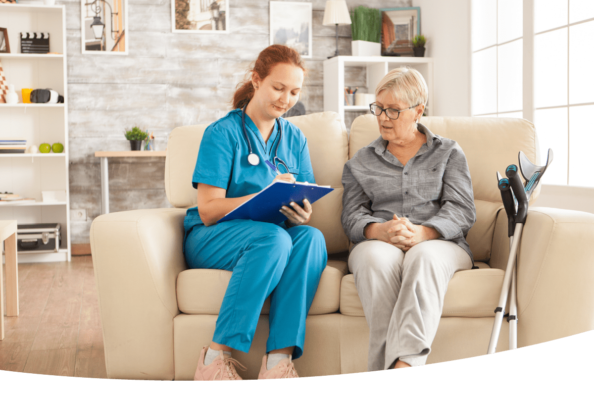 https://maimonideshealthcentervb.com/wp-content/uploads/2023/02/nurse-explaining-healthcare-to-senior-woman.png
